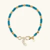 Bracciale con Rondelle in Pietra Naturale Turchese e Pepite Golden