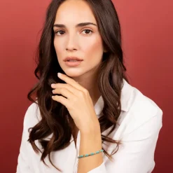 Bracciale con Rondelle in Pietra Naturale Turchese e Pepite Golden