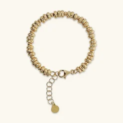 Bracciale con Rondelle Martellate e Sfere Lucide