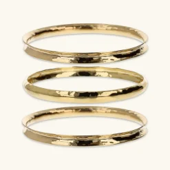 Set di Tre Bracciali Rigidi Concavi Martellati