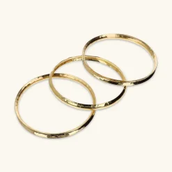Set di Tre Bracciali Rigidi Concavi Martellati